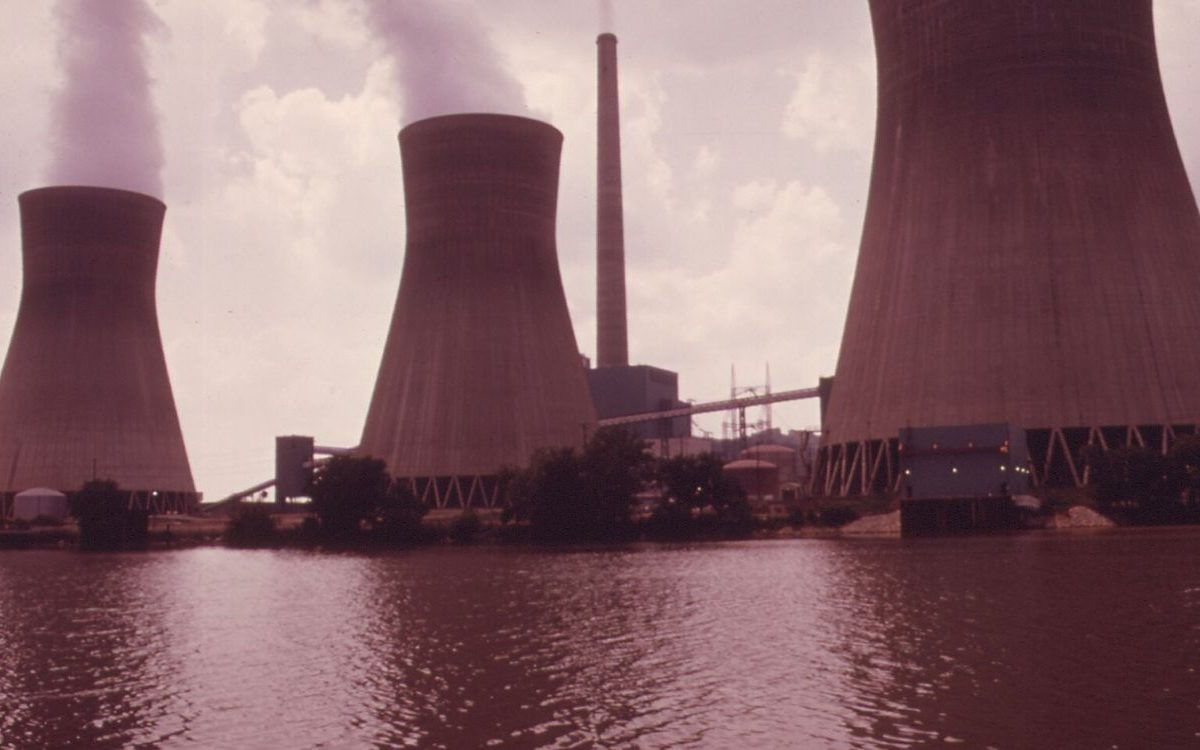Steam rising from the cooling towers of the John Amos power plant on the Kanawha River in West Virginia