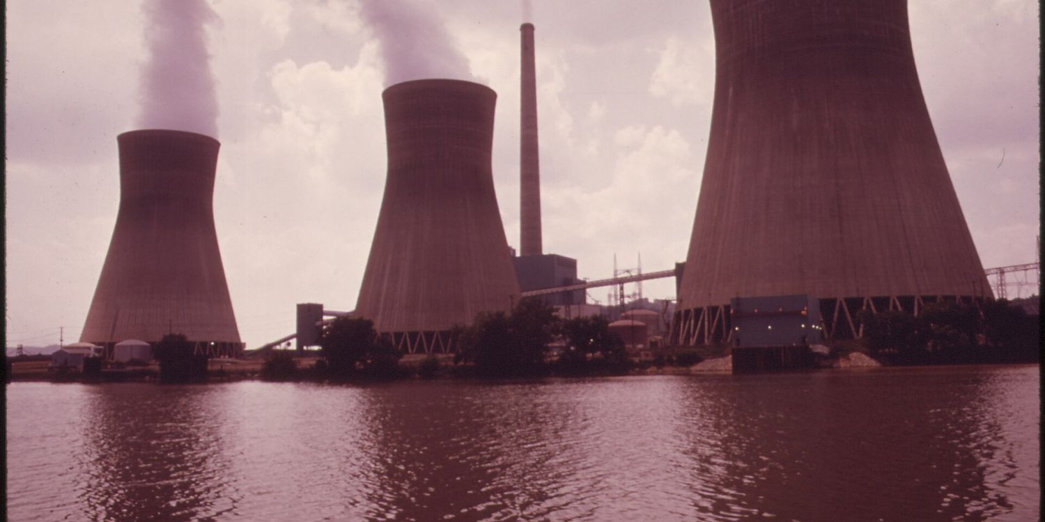 Steam rising from the cooling towers of the John Amos power plant on the Kanawha River in West Virginia