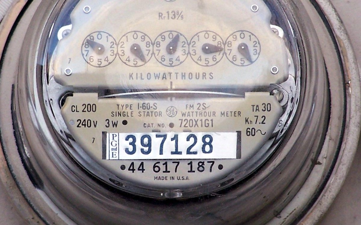A residential electric meter that counts kilowatt-hours