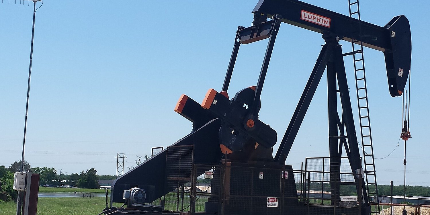An oil pump jack at a well site